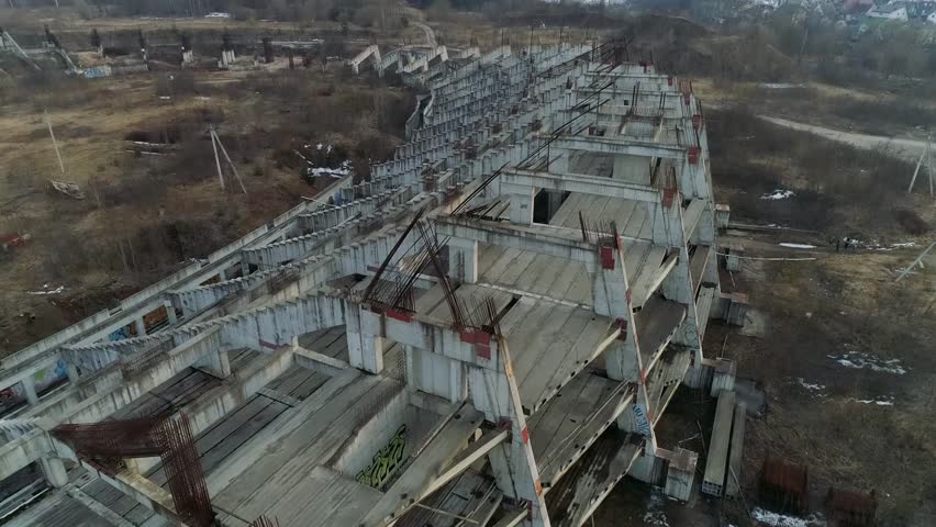 Ruins of a large football stadium construction from bird view. Close up