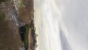 Vertical video. View of the Tiber, Ponte Palatino. Rome, Italy. Time Lapse