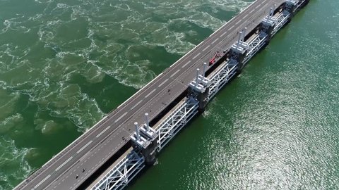 Aerial footage of The Eastern Scheldt storm surge barrier in Dutch Oosterscheldekering the largest of 13 ambitious Delta Works series of dams and storm surge barriers designed to protect Netherlands