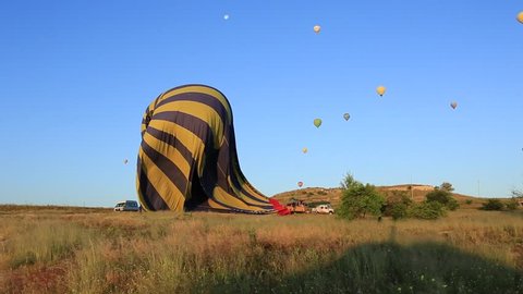 Hot air balloon being packed down Stockvideó