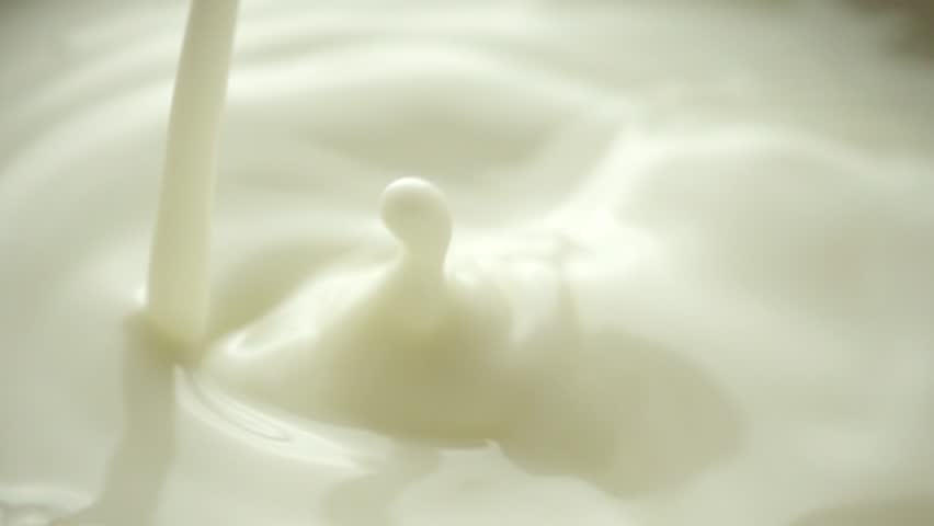 milk dropping splashing slow motion Stock Footage Video (100% Royalty ...