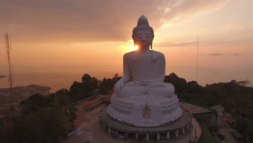 aerial photography beautiful sunset behind Phuket big Buddha is on the top of high mountain can see around the Phuket island when you are there