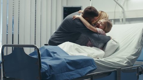 Cute Little Girl Lying in the Hospital Bed is Visited by Her Parents, They Start Hugging Her Happily! Amazing Emotional Moment, Family Bonding.