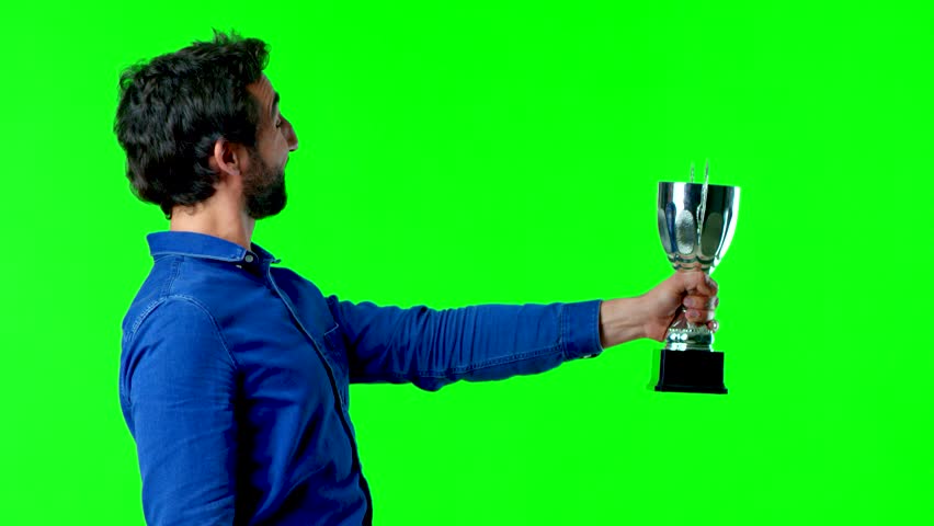 young crazy man with a trophy