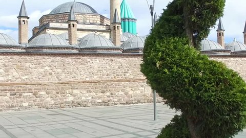Mevlana musem and great view of Mevlana Square, Konya Turkey in the afternoon,konya museum,slowmotion,slider rec,Aerial drone shot over Mevlana Rumi tomb mosque dergah