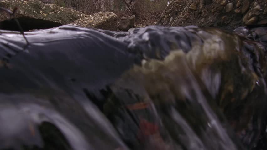 Small stream pours over rocks ECU