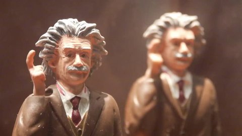 Albert Einstein Moving Figurine Behind Showcase - Static
