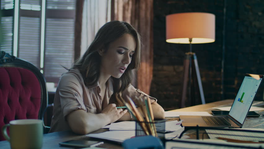 Business strategy planning. Businesswoman working with papers in home office. Serious woman doing paperwork. Business ceo analyzing finance data. Beautiful female professional working at workplace | Shutterstock HD Video #1009353713