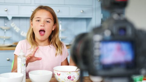 Young Girl Recording Vlog At Home Showing How To Make Slime
