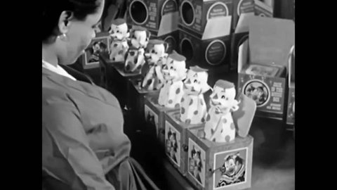 CIRCA 1950 - Toys are packaged and shipped from a factory in the 1950s.