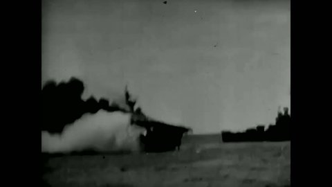 CIRCA 1940 - WW2 rough silent film clip of the Japanese bombing of the U.S.S. Franklin.