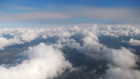 Professional video aerial shot above the clouds of mountains in 4K
