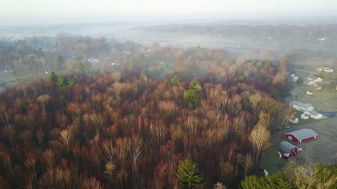Aerial shot of morning fog in the winter.: film stockowy