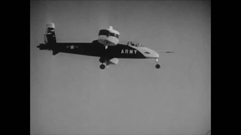 CIRCA 1956 - An army plane with ducted propellers, capable of vertical take off, is flown.
