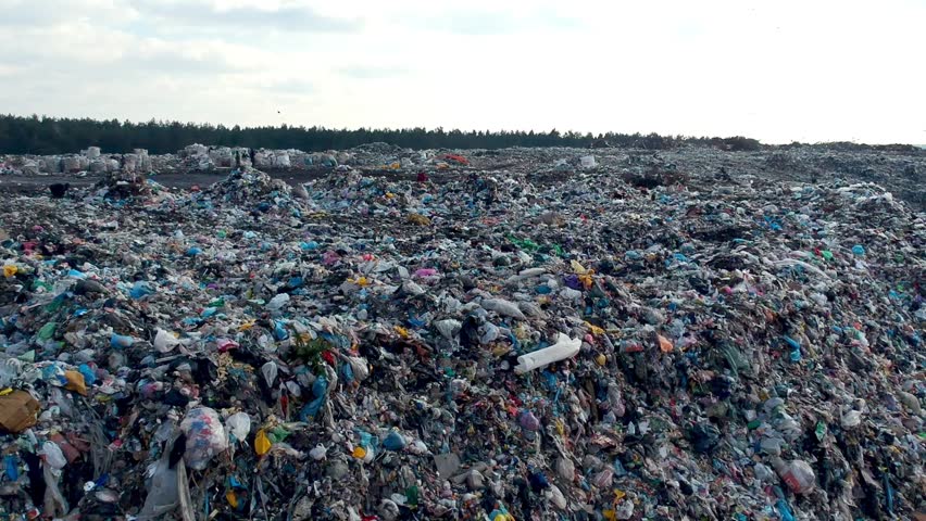 Aerial view on city garbage dump with birds  | Shutterstock HD Video #1009383326