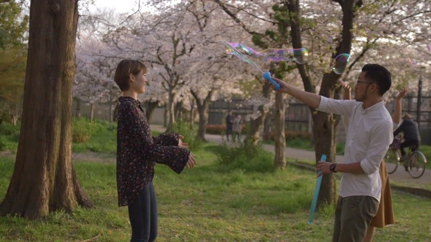 Bubble making in a park with international friends.