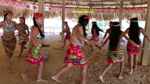 PANAMA, MAR 31: Embera women dance some traditional shamanic dances. Their dance and music are creative expressions of gratitude towards nature on Panama, March 31, 2018.