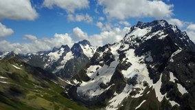 Drone video of nature landscape North Caucasus - the famous ski resort Dombay, Karachaevo-Cherkessia. Mountains in summer. 4K