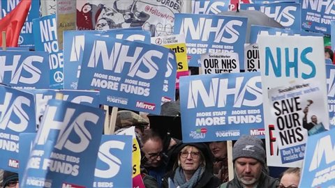 London, UK - February 2018: Tens of thousands of people march on the NHS Crisis protest