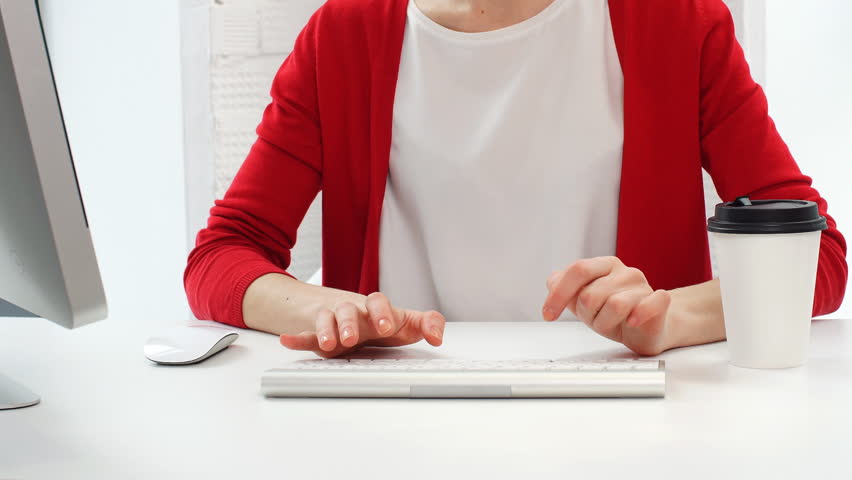 Young beautiful woman using a laptop computer at home.