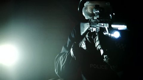 Cinematic Armed SWAT Police Officer Aims Rifle Guns In Tense Crime Action At Night, 4K.