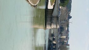 Vertical video. Tiber from Ponte Sisto. Rome, Italy