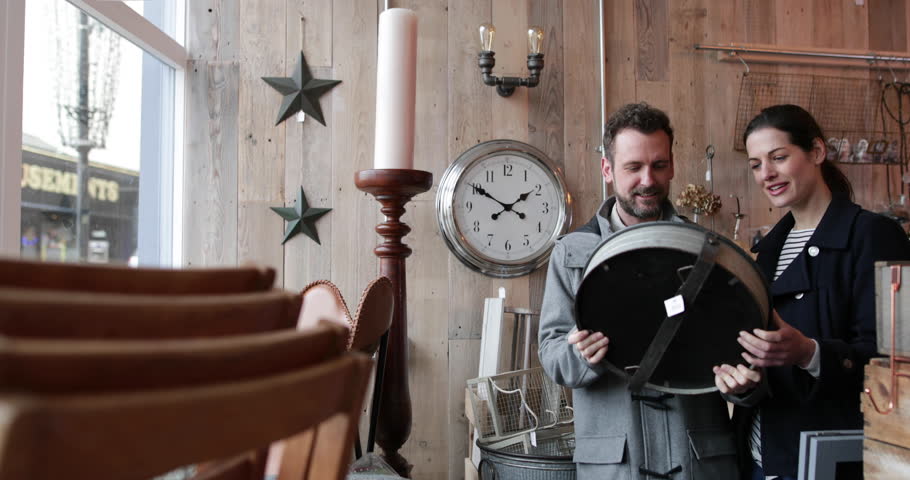 Couple shopping in vintage antique store