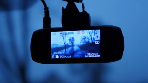 car, dash camera showing the road, speed in kilometers per hour