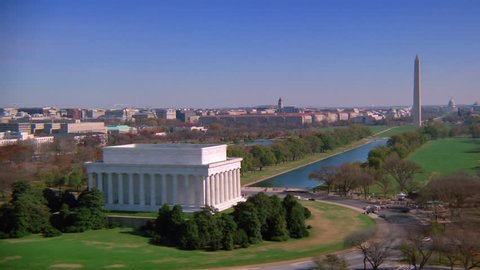 WASHINGTON DC - CIRCA 1990s - 1990s - Beautiful aerial over the Lincoln Memorial in Washington D.C. with Washington Monument background.