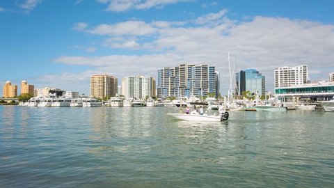 Sarasota downtown and marina view, the motor-boat floats along the gulf, Florida