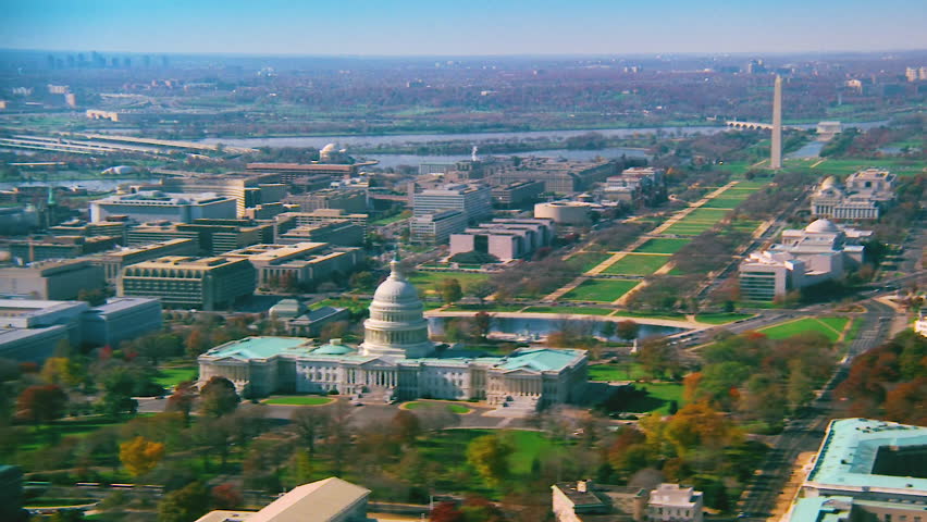 WASHINGTON DC - CIRCA 1990s - 1990s - Good aerial over capitol dome, Congress and Washington Monument in Washington D.C.