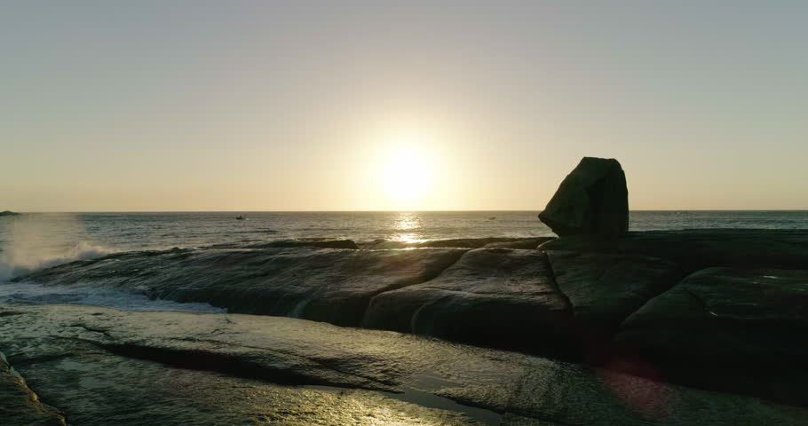 Sunrise over the rugged coastline at Bicheno, Tasmania - 4K 30P