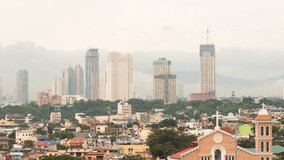 Manila skyscrapers in the cloudy evening. Philippines.