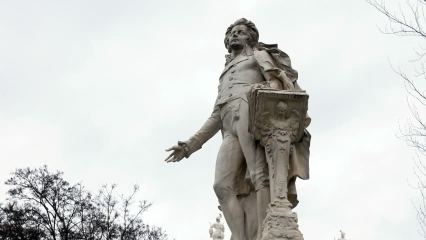 Mozart Statue in Vienna, Austria. Wolfgang Amadeus Mozart is definitely one of the best known names connected with Vienna and Austria. Mozarts statue in Vienna city center. Imperial Palace Gardens