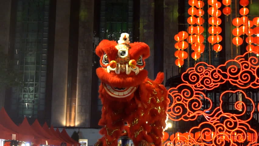 Chinese lion performing at night, Lunar new year celebration in Chinatown, Slow motion.  Royalty-Free Stock Footage #1009451219