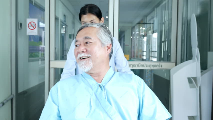 Woman take care to old man at hospital. Healthcare and medical concept. | Shutterstock HD Video #1009461242