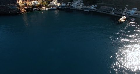 Aerial footage of Santorini, port, lift