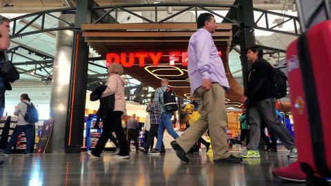 Duty free shop at Istanbul airport. A crowd of people hurry to the flight. Slow motion. Istanbul, Turkey, 16, March-2018.