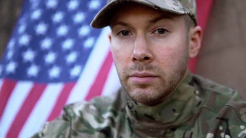 Proud American Soldier Man In Front Of Stars And Stripes Flag. Part Of A 4K Military Collection With A Variety Of Camera Angles And Stories.