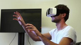 New York City, NYC - March 17, 2018: 360 Vr Gaming Concept, A Man Wearing Vr Headset Moving His Hands.