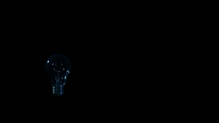 light bulb  on black background  old  technology,thinking idea concetp 