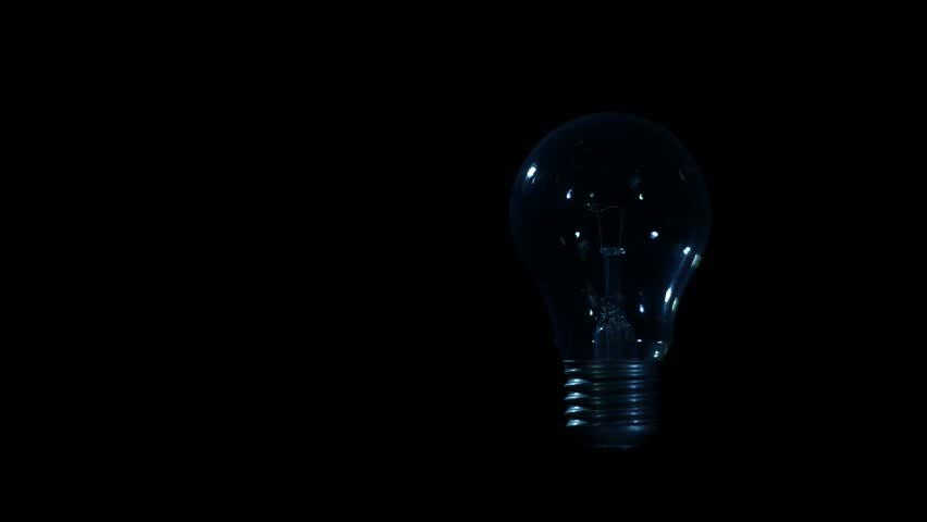 light bulb  on black background  old  technology,thinking idea concetp 