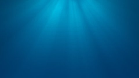 Calm Underwater Light Rays. Abstract light rays of sunshine through a soft blue background with a tranquil feeling of being under water near the surface.
