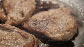 Close-up of mouth-watering lunch in hot oil 4K 2160p 30fps UltraHD footage - Frying of fresh pork meat in the wok 3840X2160 UHD video
