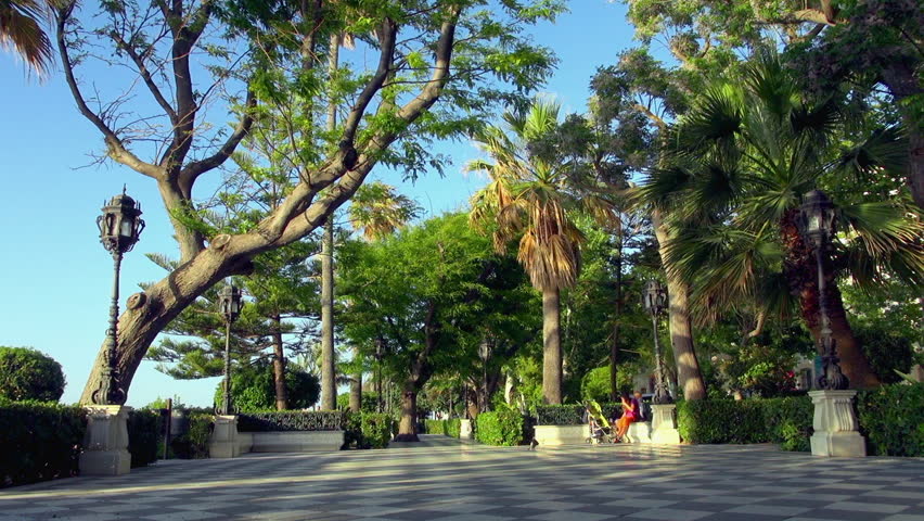 Cadiz Port City Park with People Biking in the Area