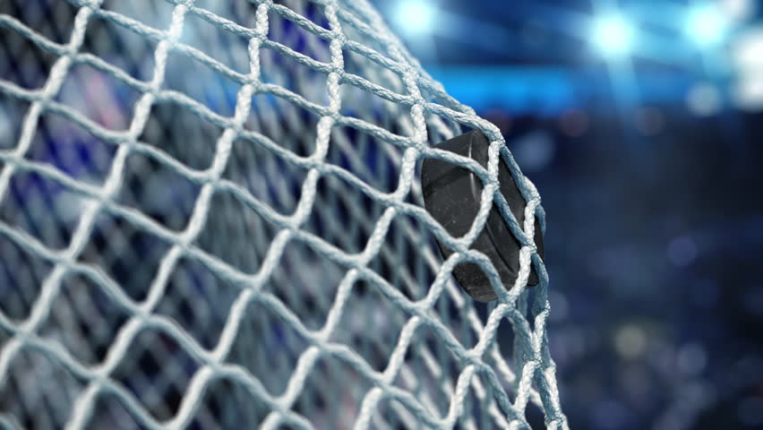 Hockey Puck Flies Into Net On Stock Footage Video 100 Royalty Free
