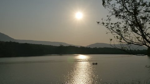 Family tourists paddling kayak at sunrise, beautiful landscape. Stock Video