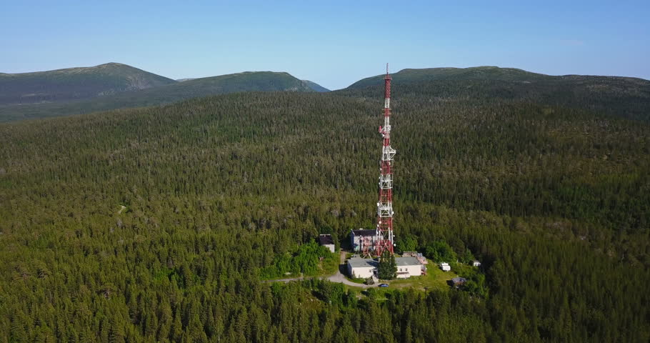 Aerial Landscape of a Nothern Nature. Radio TV Antenna Tower at the top of the Hill. Location Kola Peninsula in Russia near the Kandalaksha town
