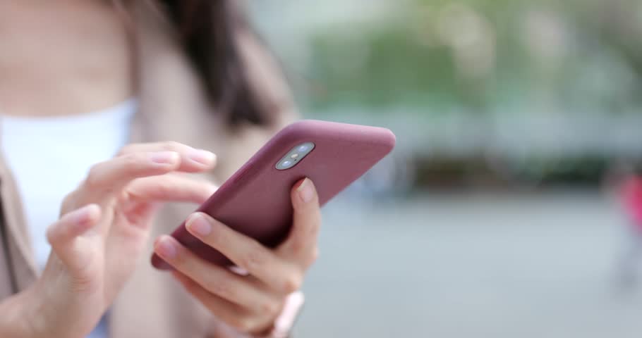 Close up of woman using smart phone