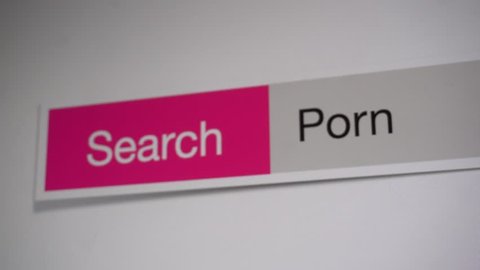 Porn - browser search query online, typing in the search term into Internet. Search web form, tablet screen shot close up. 